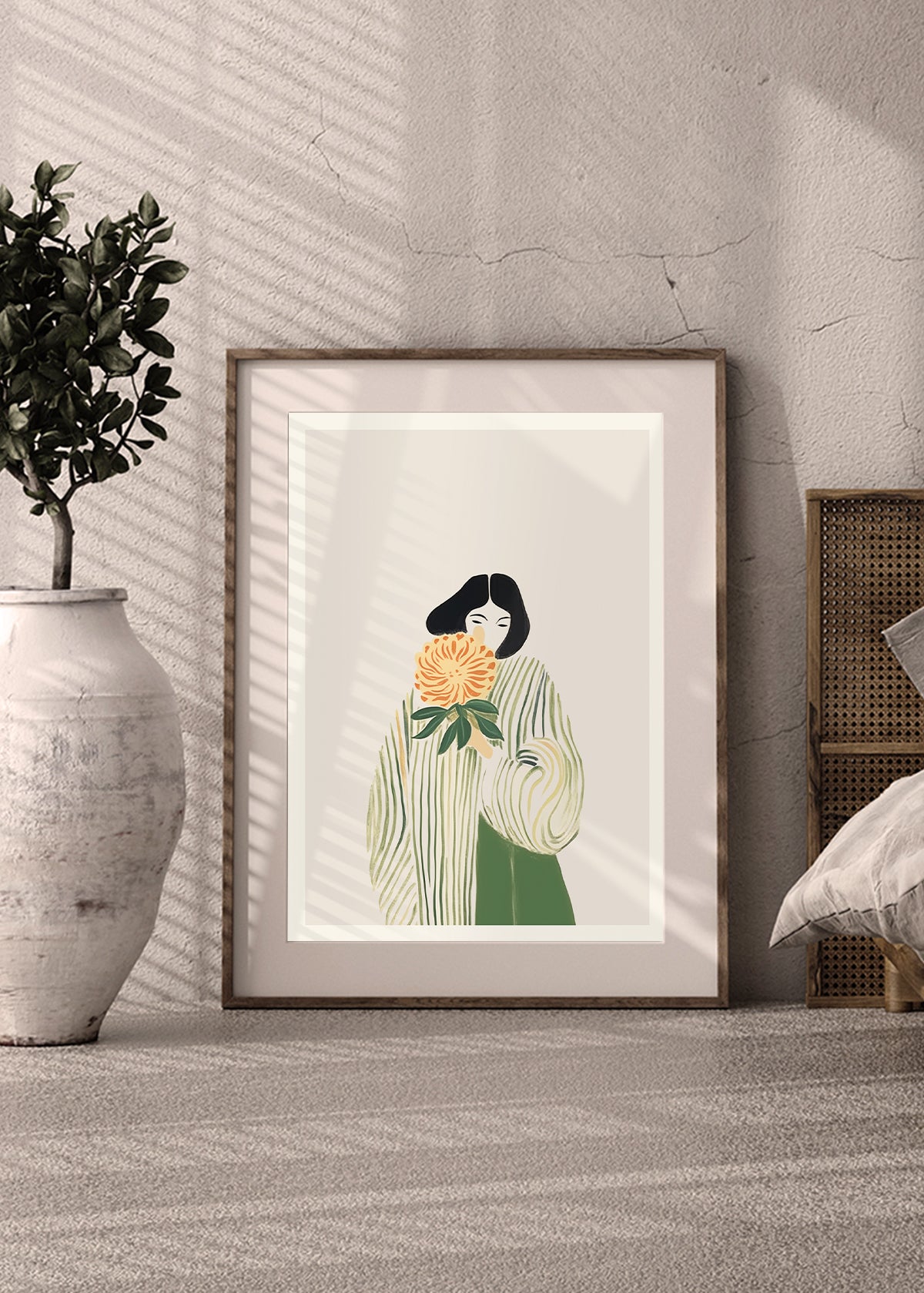 Lady smelling flower